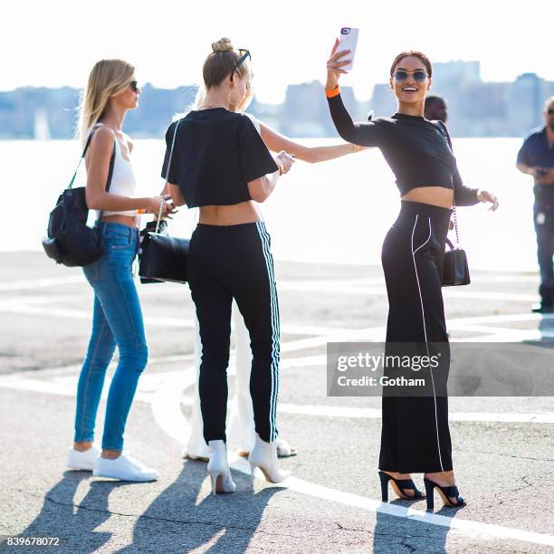 Models Nadine Leopold, Hannah Ferguson and Shanina Shaik are seen in Chelsea on August 26, 2017 in New York City.