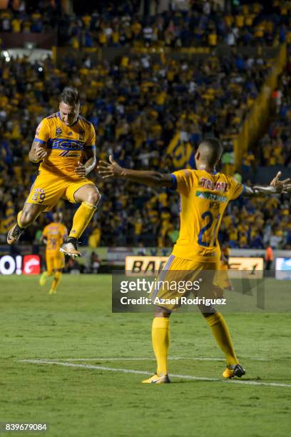 Eduardo Vargas of Tigres celebrates after scoring his team's second goal during the seventh round match between Tigres UANL and Lobos BUAP as part of...