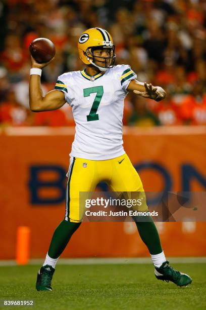 Quarterback Brett Hundley of the Green Bay Packers throws a pass in the second quarter of a Preseason game against the Denver Broncos at Sports...