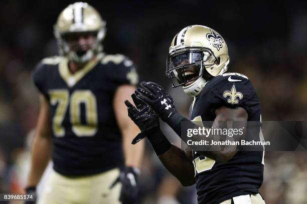 Rafael Bush of the New Orleans Saints celebrates a sack during the second half of a preseason game against the Houston Texans at the Mercedes-Benz...