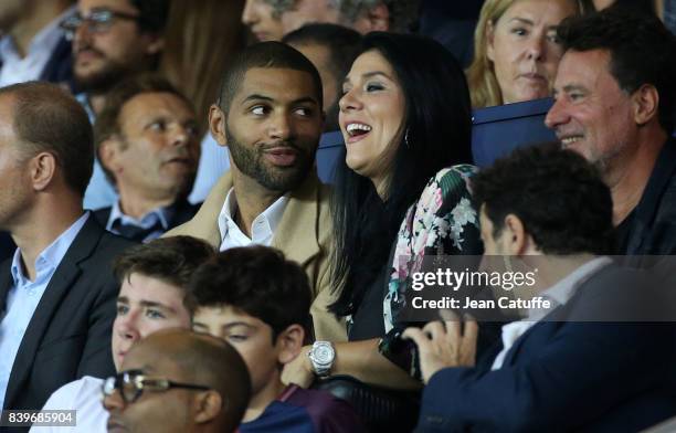 Nicolas Batum of Charlotte Hornets and his companion Aurelie Etchart attend the French Ligue 1 match between Paris Saint Germain and AS Saint-Etienne...