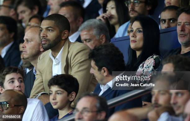 Nicolas Batum of Charlotte Hornets and his companion Aurelie Etchart attend the French Ligue 1 match between Paris Saint Germain and AS Saint-Etienne...