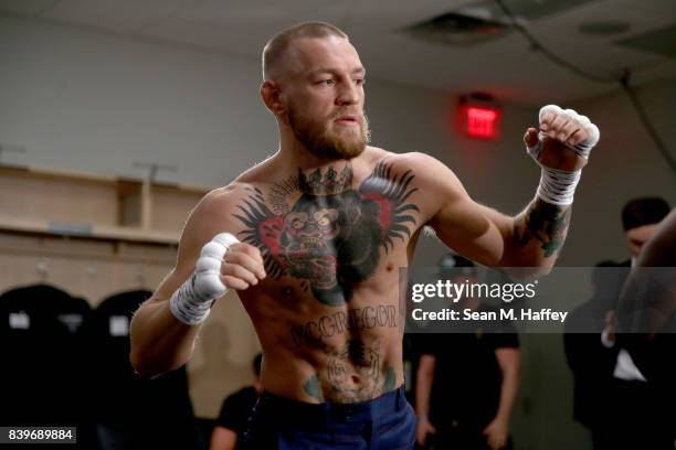 Conor McGregor warms up in his locker room prior to his super welterweight boxing match against Floyd Mayweather Jr. On August 26, 2017 at T-Mobile...