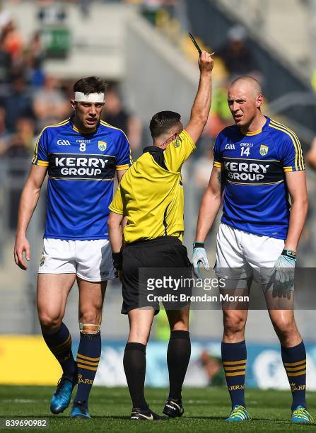 Dublin , Ireland - 26 August 2017; Kieran Donaghy, right, of Kerry is shown a yellow card by referee David Gough during the GAA Football All-Ireland...