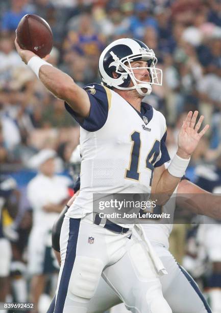 Sean Mannion of the Los Angeles Rams throws the ball during the preseason game between the Los Angeles Rams and Los Angeles Chargers at the Los...