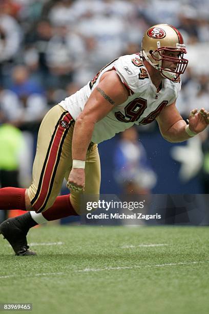 Justin Smith of the San Francisco 49ers defends during an NFL football game against the Dallas Cowboys at Texas Stadium on November 23, 2008 in...