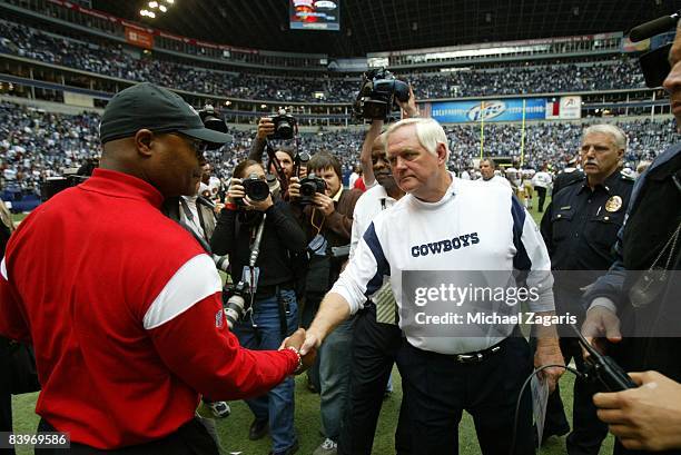 Head coach Mike Singletary of the San Francisco 49ers greets head coach Wade Phillips of the Dallas Cowboys after the NFL game at Texas Stadium on...