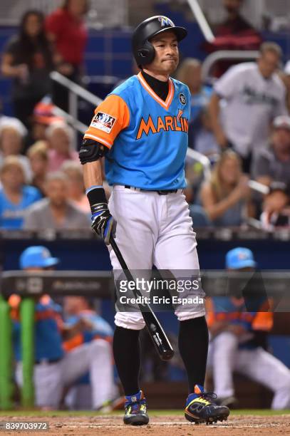 Ichiro Suzuki of the Miami Marlins reacts after fouling a pitch off during the seventh inning against the San Diego Padres at Marlins Park on August...