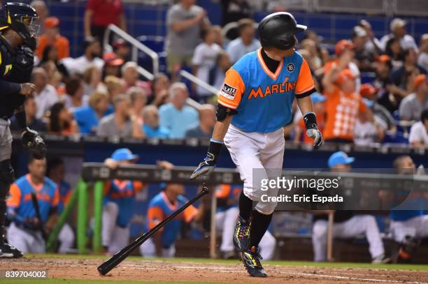 Ichiro Suzuki of the Miami Marlins singles during the seventh inning against the San Diego Padres at Marlins Park on August 26, 2017 in Miami,...