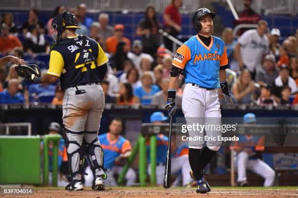 Ichiro Suzuki of the Miami Marlins reacts after fouling a pitch off during the seventh inning against the San Diego Padres at Marlins Park on August...