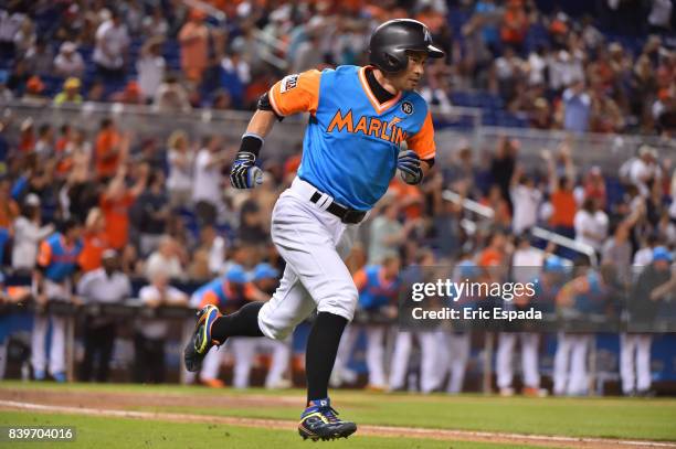 Ichiro Suzuki of the Miami Marlins singles during the seventh inning against the San Diego Padres at Marlins Park on August 26, 2017 in Miami,...