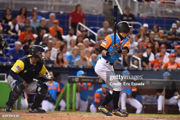 Ichiro Suzuki of the Miami Marlins singles during the seventh inning against the San Diego Padres at Marlins Park on August 26, 2017 in Miami,...