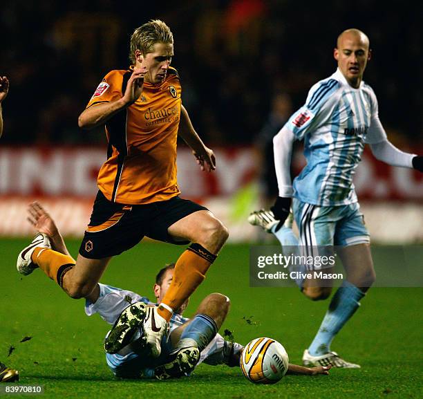 David Edwards of Wolves skips through a tackle during the Coca-Cola Championship match between Wolverhampton Wanderers and Derby County at Molineux...