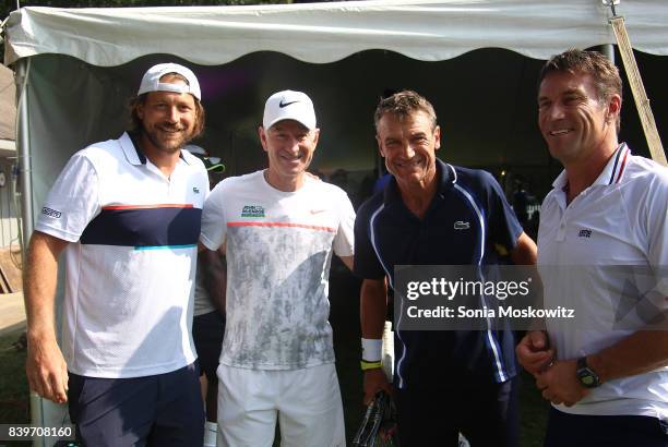 Guest, John McEnroe, Mats Wilander, and Pat Cash attend the Third Annual Johnny Mac Tennis Project Pro Am Event at Sportime on August 26, 2017 in...