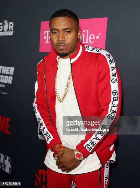 Recording artist Nas arrives on T-Mobile's magenta carpet duirng the Showtime, WME IME and Mayweather Promotions VIP Pre-Fight Party for Mayweather...