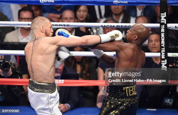 Floyd Mayweather Jnr defeats Conor McGregor during their fight at the T-Mobile Arena, Las Vegas.