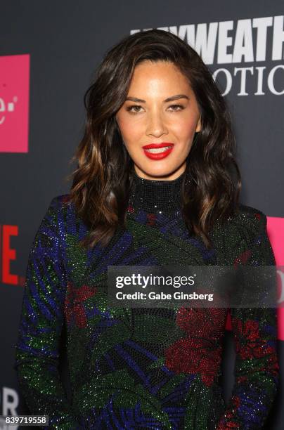 Actress Olivia Munn arrives on T-Mobile's magenta carpet duirng the Showtime, WME IME and Mayweather Promotions VIP Pre-Fight Party for Mayweather...