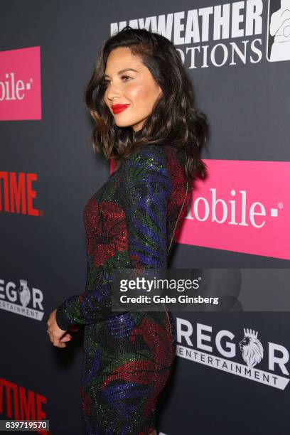 Actress Olivia Munn arrives on T-Mobile's magenta carpet duirng the Showtime, WME IME and Mayweather Promotions VIP Pre-Fight Party for Mayweather...