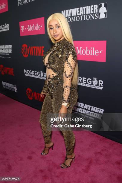 Recording artist Cardi B arrives on T-Mobile's magenta carpet duirng the Showtime, WME IME and Mayweather Promotions VIP Pre-Fight Party for...