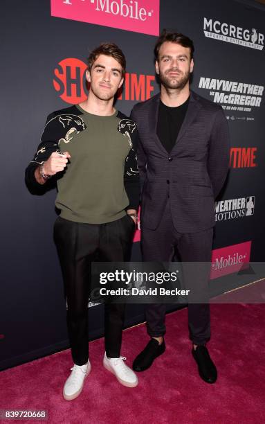 Recording Artists Andrew Taggart and Alex Pall of The Chainsmokers arrive on T-Mobile's magenta carpet duirng the Showtime, WME IME and Mayweather...