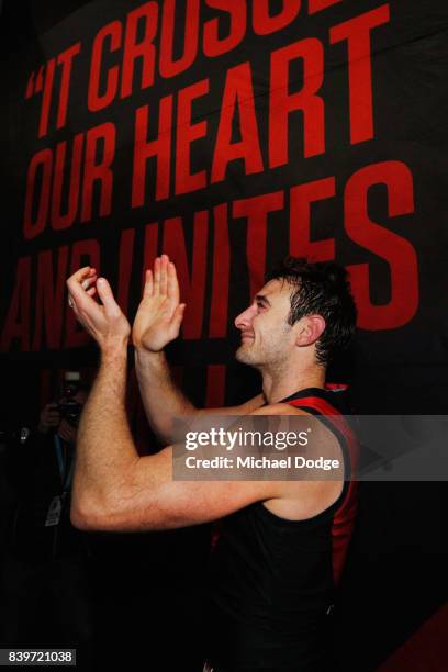 Jobe Watson of the Bombers celebrates the win with fans during the round 23 AFL match between the Essendon Bombers and the Fremantle Dockers at...