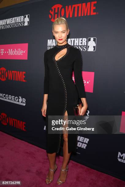 Model Karlie Kloss arrives on T-Mobile's magenta carpet duirng the Showtime, WME IME and Mayweather Promotions VIP Pre-Fight Party for Mayweather vs....