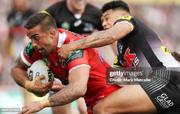 Paul Vaughan of the Dragons scores a try during the round 25 NRL match between the Penrith Panthers and the St George Illawarra Dragons at Pepper...