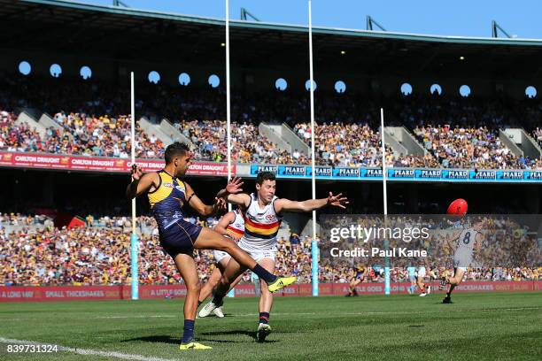 Lewis Jetta of the Eagles passes the ball during the round 23 AFL match between the West Coast Eagles and the Adelaide Crows at Domain Stadium on...
