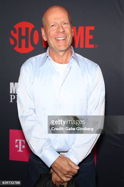 Actor Bruce Willis arrives on T-Mobile's magenta carpet duirng the Showtime, WME IME and Mayweather Promotions VIP Pre-Fight Party for Mayweather vs....
