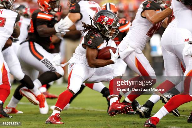 Runningback Jacquizz Rogers of the Tampa Bay Buccaneers on a running play during the game against the Cleveland Browns at Raymond James Stadium on...