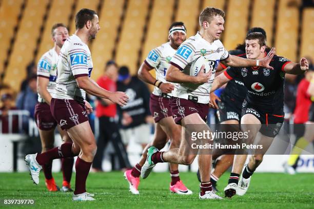Tom Trbojevic of the Sea Eagles makes a break during the round 25 NRL match between the New Zealand Warriors and the Manly Sea Eagles at Mt Smart...