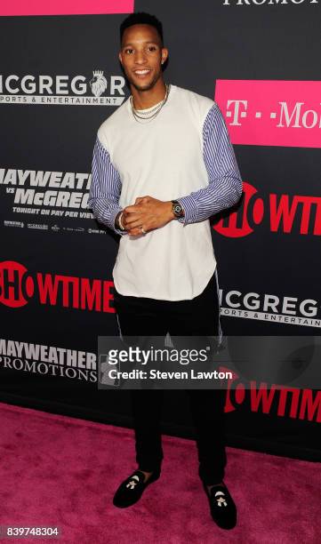 Player Evan Turner attends the VIP party before the boxing match between boxer Floyd Mayweather Jr. And Conor McGregor at T-Mobile Arena on August...