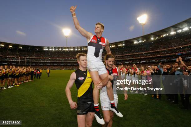 Nick Riewoldt of the Saints is chaired off in his final game after the round 23 AFL match between the Richmond Tigers and the St Kilda Saints at...