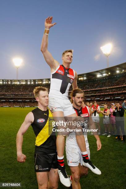 Nick Riewoldt of the Saints is chaired off in his final game after the round 23 AFL match between the Richmond Tigers and the St Kilda Saints at...