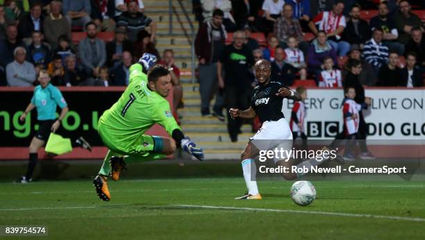 West Ham United's Andre Ayew scores his side's second goal during the Carabao Cup Second Round match between Cheltenham Town and West Ham United at...