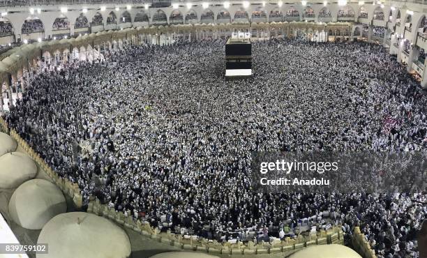 Muslim prospective Hajj pilgrims circumambulate around the Kaaba, Islam's holiest site, located in the center of the Masjid al-Haram in Mecca, Saudi...