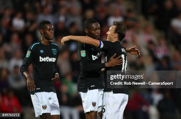 West Ham United's Diafra Sakho celebrates scoring his side's first goal with Edimilson Fernandes and Mark Noble during the Carabao Cup Second Round...