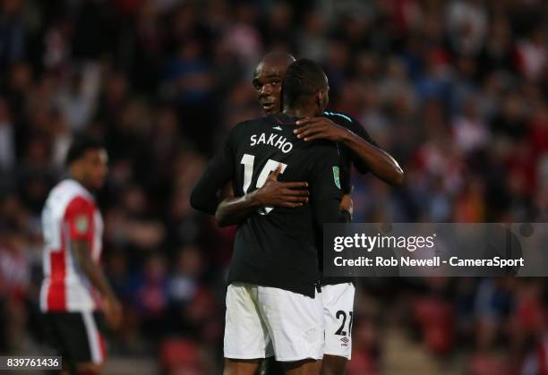 West Ham United's Diafra Sakho celebrates scoring his side's first goal with Angelo Ogbonna during the Carabao Cup Second Round match between...