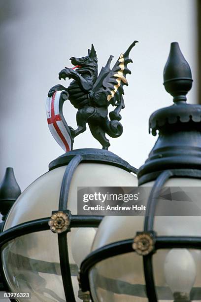 city of london dragon and lamps - city of london dragon stock pictures, royalty-free photos & images