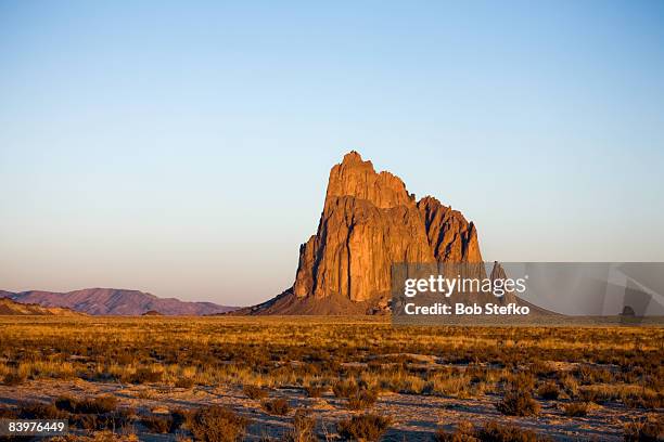 shiprock seen at sunrise - pico ship rock imagens e fotografias de stock