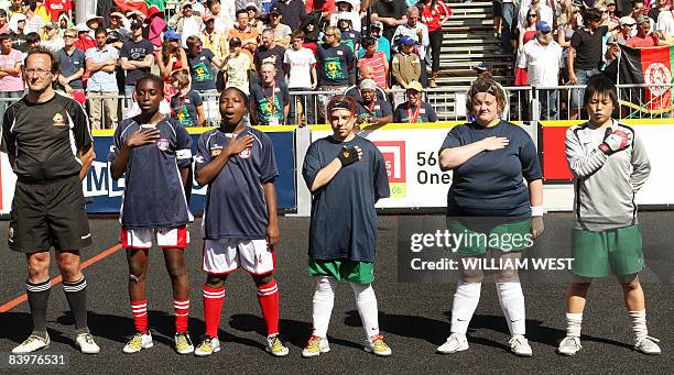 Photo taken on December 7, 2008 shows only two Liberian players, Dehkontee Sayon and Bendu Goi , singing the national anthem with three Australian...