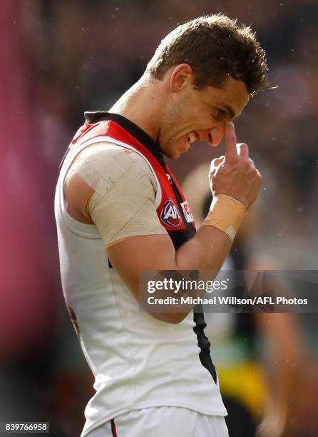 Luke Dunstan of the Saints rues a misses shot on goal during the 2017 AFL round 23 match between the Richmond Tigers and the St Kilda Saints at the...