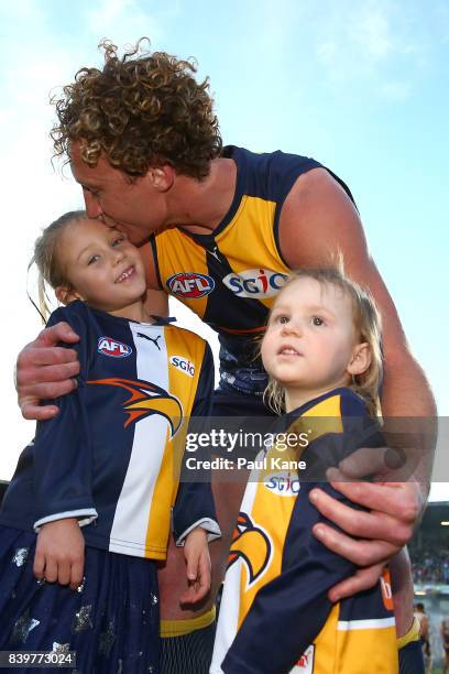 Matt Priddis of the Eagles shares a moment with his children after winning the round 23 AFL match between the West Coast Eagles and the Adelaide...