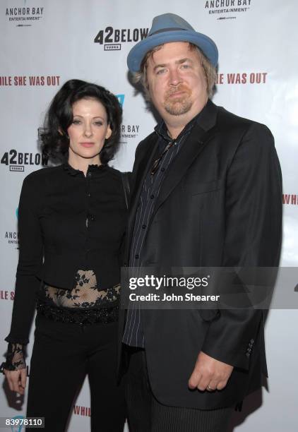 Director Susan Montford and producer Don Murphy arrive at the Los Angeles premiere of "While She Was Out" at the ArcLight Theater on December 9, 2008...