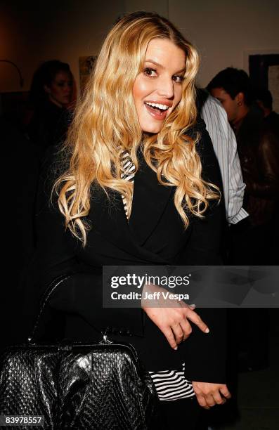 Singer Jessica Simpson attends the gallery opening of "Without You I'm Just Me" held at Gallery 1988 on December 9, 2008 in West Hollywood,...