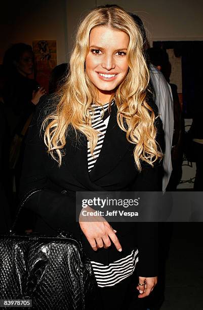 Singer Jessica Simpson attends the gallery opening of "Without You I'm Just Me" held at Gallery 1988 on December 9, 2008 in West Hollywood,...