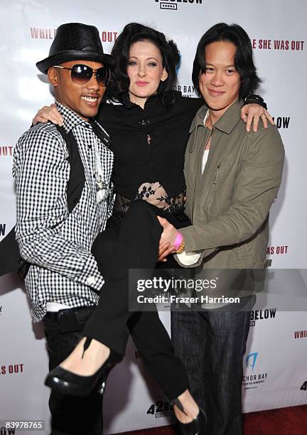 Actors Jamie Starr, and Leonard Wu, hold Susan Montford, director at the premiere Of Anchor Bay Entertainment's "While She Was Out" on December9,...