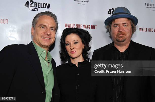 Anchor Bay's Gordon Prend, Senior Vice president Worldwide Marketing Director, Susan Montford, Director and GDon Murphy, poducer pose at the premiere...