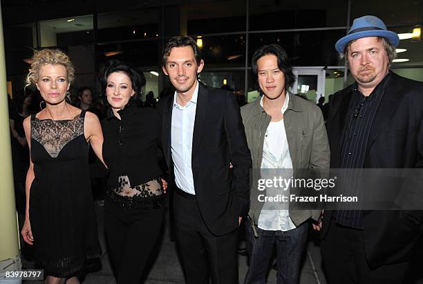 Actress Kim Basinger,Susan Montford, Lukas Haas, Leonard Wu, actor and Don Murphy, producer pose at the premiere Of Anchor Bay Entertainment's "While...