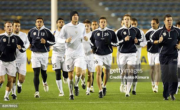 Travid Dodd and other players of Adelaide United during the official training session at the National Stadium on December 10, 2008 in Tokyo, Japan....